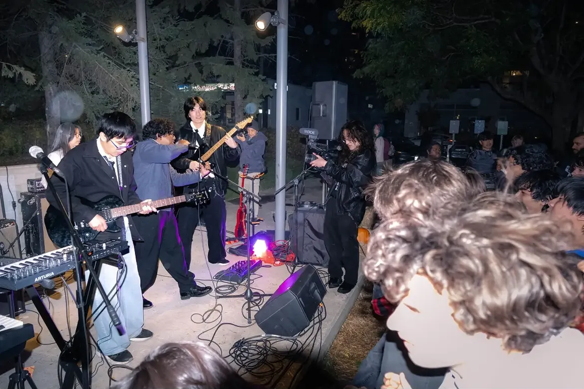 Vu Cao with bandmates